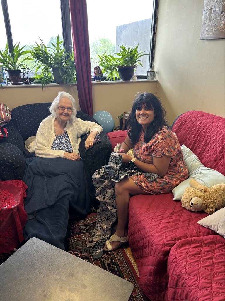 Giselle with her Nana, who has never stopped knitting and sewing for the family.